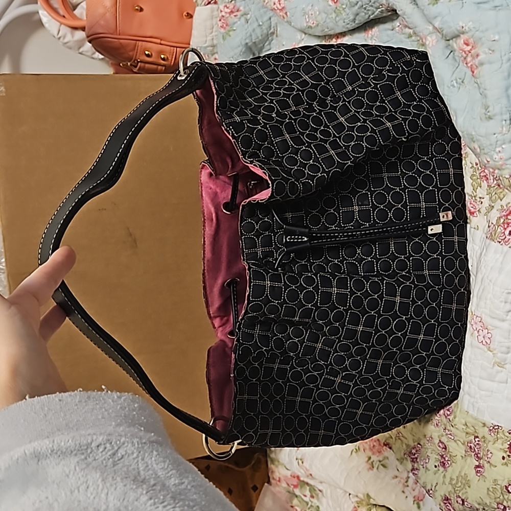 Kate Spade New York Black Fabric and Fuchia Suede Interior.